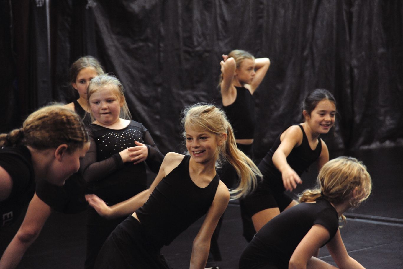 Competition team dancer practicing in technique classes